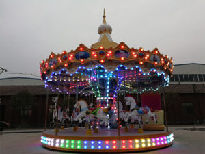 What is the purpose of the light design of the carousel?
